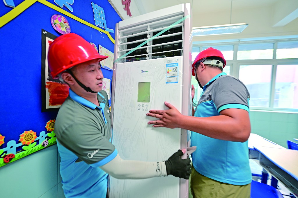 暑期全速推进 南岸区58所学校安装新空调 惠及十万余名师生.jpg